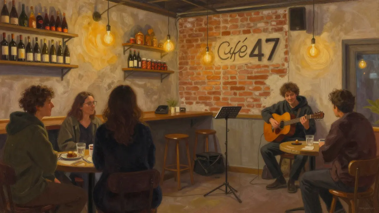 Cozy open mic night at Café 47 with a poet and guitarist performing to a small, attentive audience.