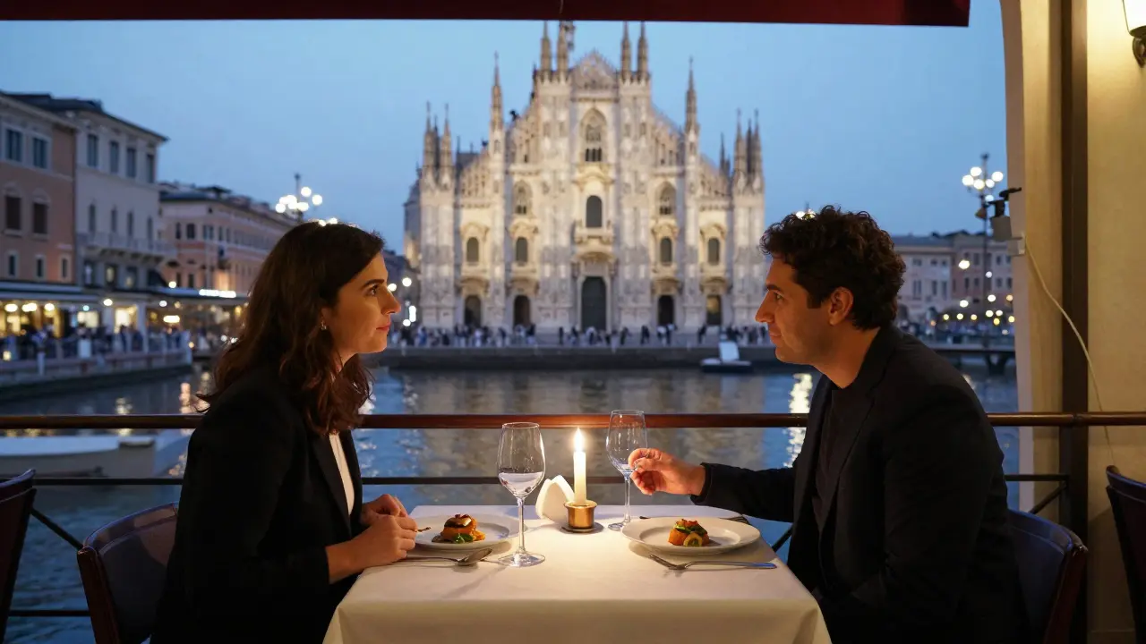 Two people dining candlelit by the Navigli canal with the Duomo in the distance.